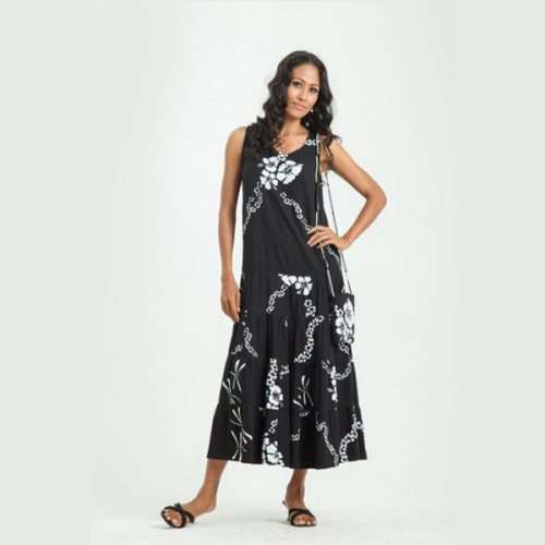 Woman in black floral midi dress posing