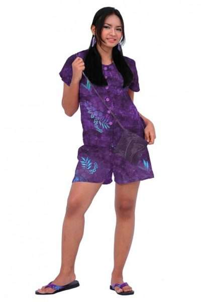 Woman modeling purple floral shorts set