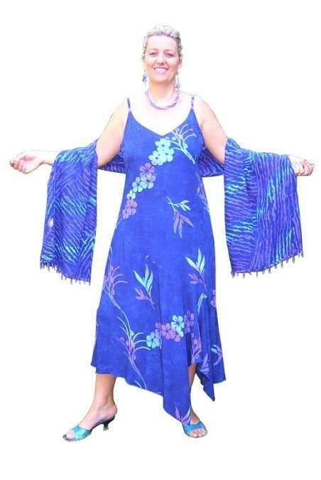 Woman in blue fringed dress smiling