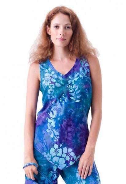 Woman wearing blue floral sleeveless top