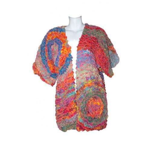 Colorful handmade knitted sweater on mannequin