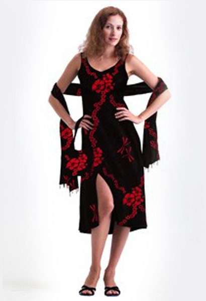 Woman in black and red floral dress posing