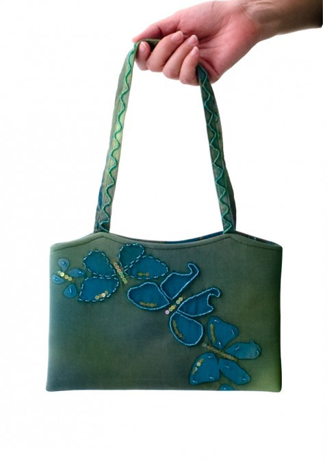Handmade tropical handbag with blue floral design