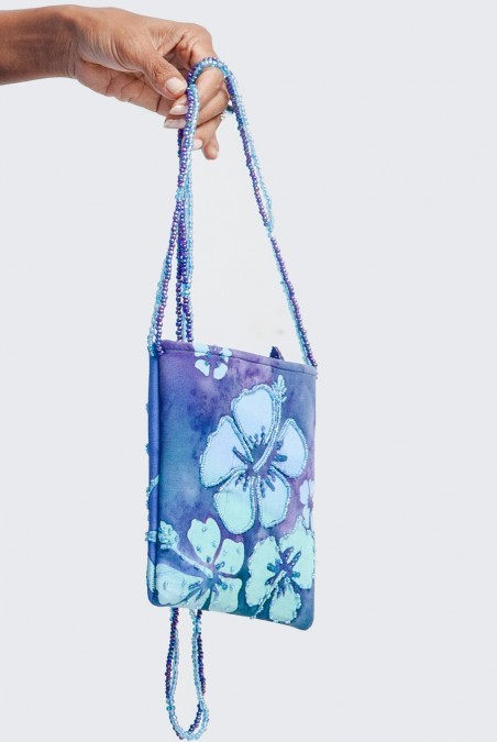 Blue beaded Hawaiian purse with white hibiscus flower design