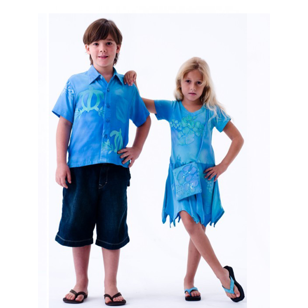 Boy and girl wearing blue tropical batik children's clothing